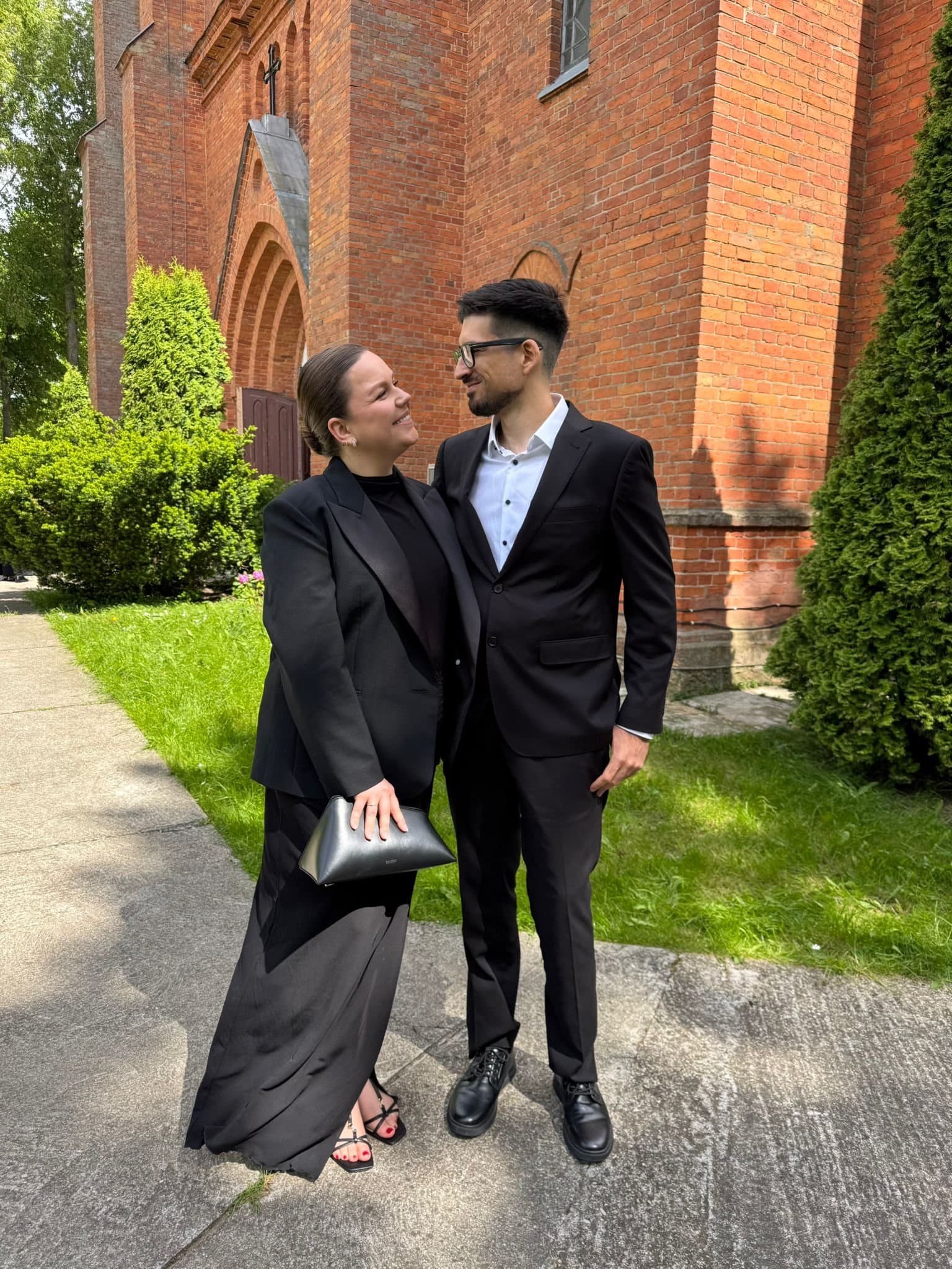 Rūta and Nacho together outside the church