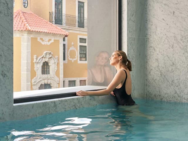 The indoor pool at PortoBay Flores, overlooking Porto's historic centre